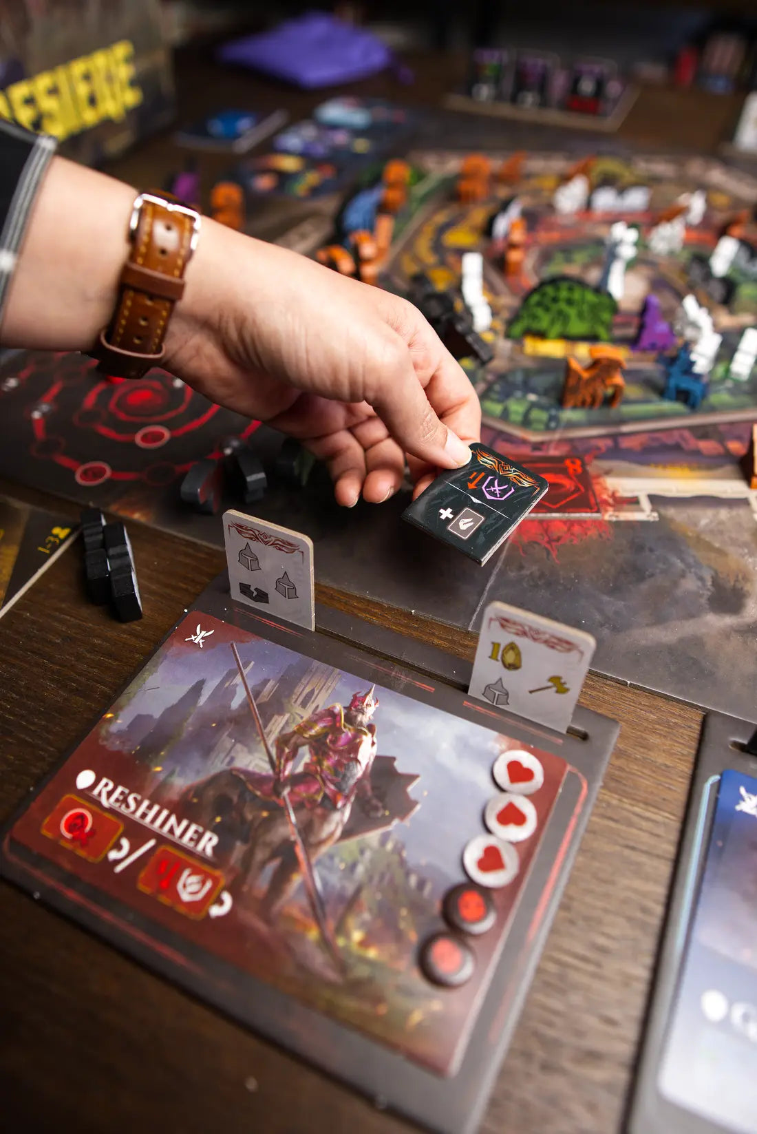 Firesiege on the table during a game